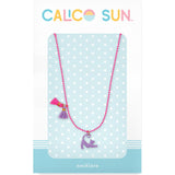 Zoey Cat Necklace by Calico Sun Displayed on card—a playful enamel purple cat charm with pink/purple tassels on adjustable pink ball chain, available at Be Charmed.