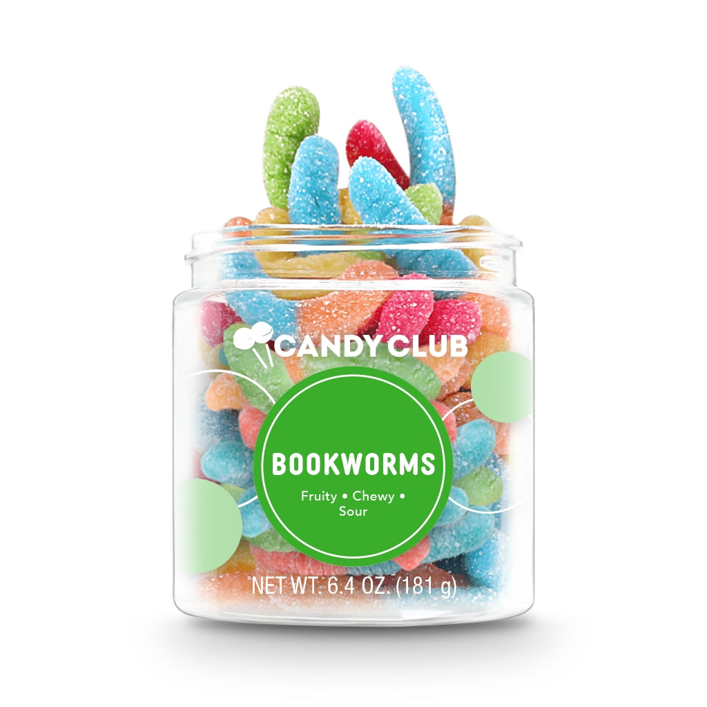 Jar of colorful candy labeled 'Candy Club Bookworms' on a white background. Available at Be Charmed. 
