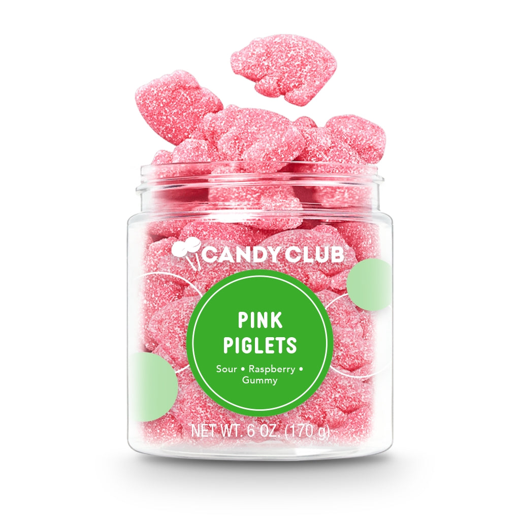 Jar of pink gummy candy labeled 'Pink Piglets' from Candy Club on a white background. Available at Be Charmed. 