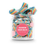 Jar of colorful rainbow sour belts with 'Candy Club' label on a white background. Available at Be Charmed. 