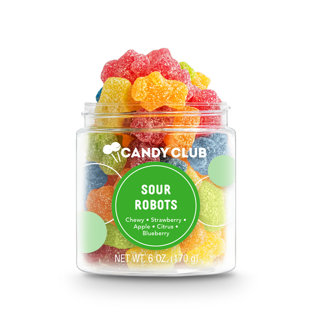 A clear plastic jar filled with various colorful gummy candies, labeled 'Candy Club Sour Robots' with flavors listed as strawberry, apple, and blueberry.