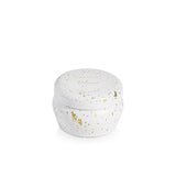 Capri Blue volcano glimmer mini tin candle in a white container with gold speckles on a white background. Available at Be Charmed. 
