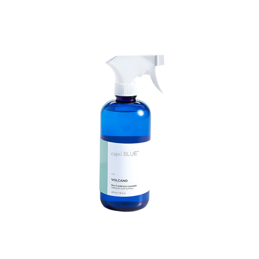 Capri Blue Volcano Multi-Surface Cleaner 16 oz spray—vegan, toxin-free citrus‑pineapple cleaner infused with grapefruit+tangerine oils, safe for countertops, available at Be Charmed.