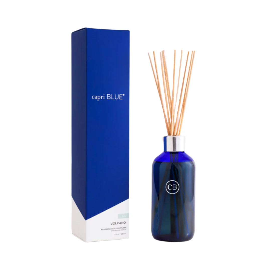 Volcano Reed Signature Diffuser by Capri Blue—citrus-pineapple fragrance with natural reeds in reusable glass vessel, elegant home scent, available at Be Charmed.