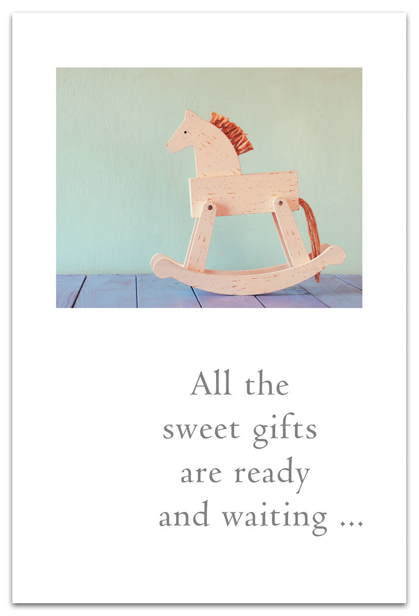 Baby Shower Card – vintage-style illustration of a wooden rocking horse with a loving message to welcome a baby, perfect for new parents, available at Be Charmed