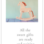 Baby Shower Card – vintage-style illustration of a wooden rocking horse with a loving message to welcome a baby, perfect for new parents, available at Be Charmed