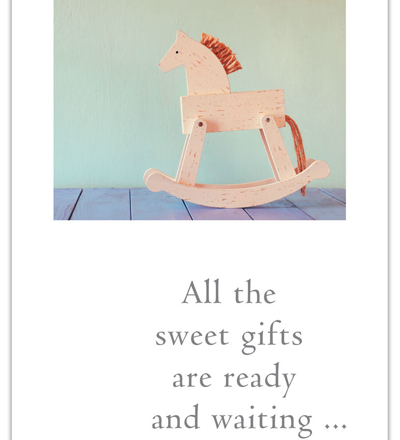 Baby Shower Card – vintage-style illustration of a wooden rocking horse with a loving message to welcome a baby, perfect for new parents, available at Be Charmed