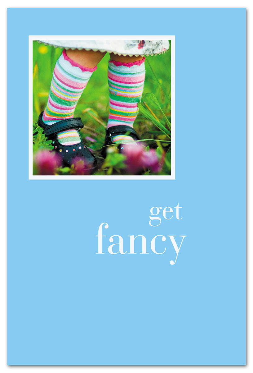 Be Charmed birthday card “Girl in Striped Socks” – whimsical illustration of a girl wearing colorful striped socks, playful design perfect for celebrating birthdays, available at Be Charmed.
