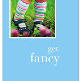 Be Charmed birthday card “Girl in Striped Socks” – whimsical illustration of a girl wearing colorful striped socks, playful design perfect for celebrating birthdays, available at Be Charmed.