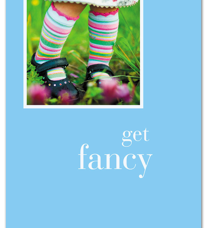 Be Charmed birthday card “Girl in Striped Socks” – whimsical illustration of a girl wearing colorful striped socks, playful design perfect for celebrating birthdays, available at Be Charmed.
