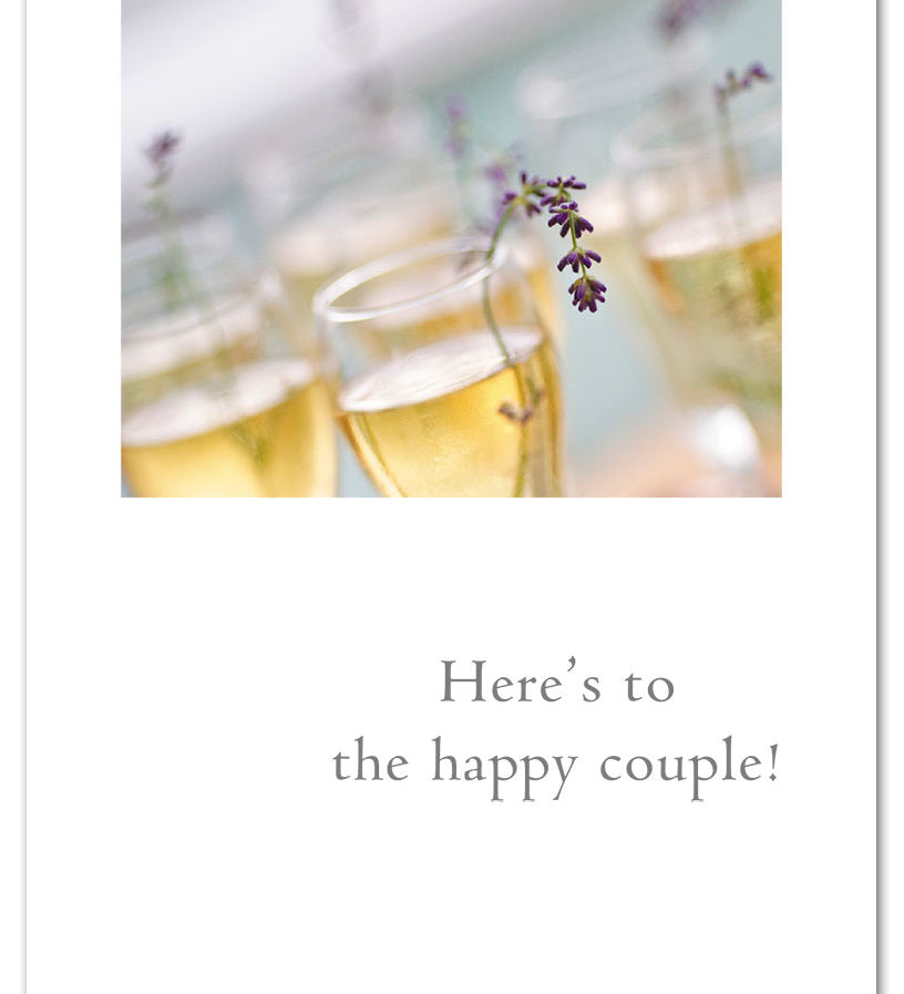 Wedding Card – elegant champagne glasses and lavender illustration with a romantic message to celebrate a couple’s special day, available at Be Charmed