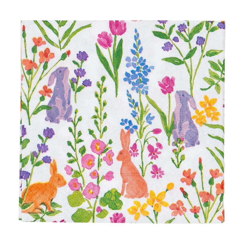 Patterned napkin with colorful rabbits and flowers on a white background. Available at Be Charmed
