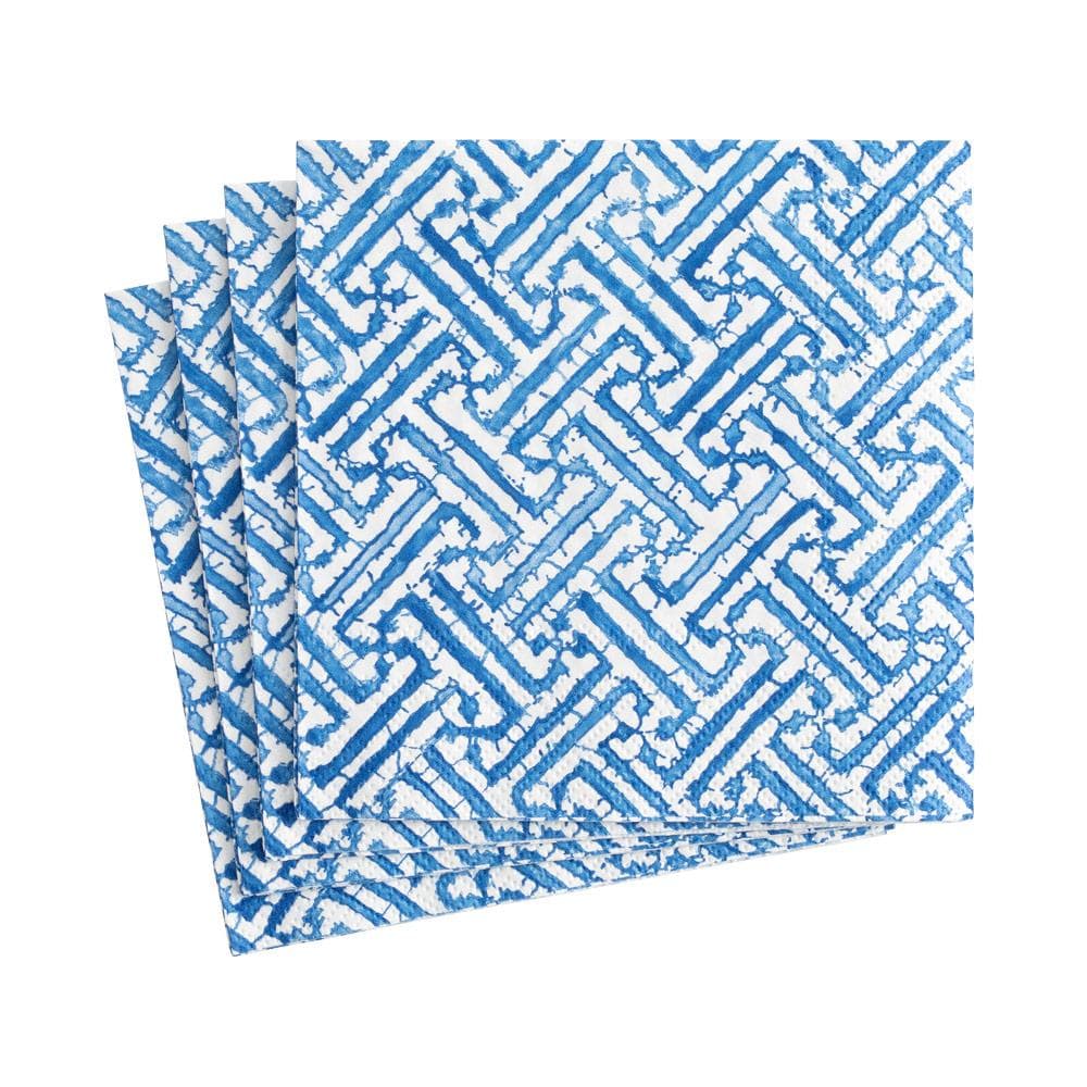 Set of blue and white patterned napkins on a white background. Available at Be Charmed