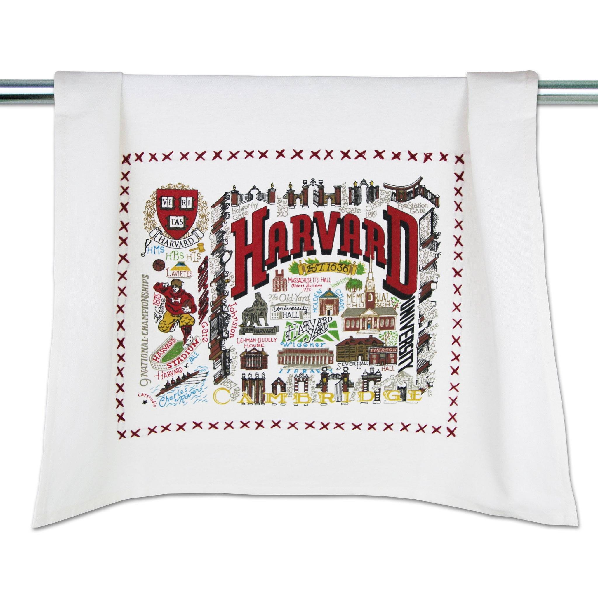 Catstudio Harvard-themed towel with various illustrations and text on a white background. Be Charmed