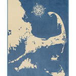 ChappyWrap Cape and Islands Map Blanket with a detailed illustration of Cape Cod, Martha’s Vineyard, and Nantucket in calming ocean hues. Crafted in a soft, durable cotton blend—ideal for beach homes or New England lovers. Available at Be Charmed.