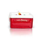 Red toy box with 'nora Fleming' branding on a white background. Available at Be Charmed