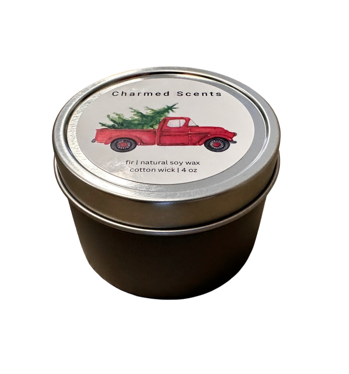 4 oz Tree Truck soy candle tin by Charmed Scents – festive holiday candle in a metal tin with evergreen aroma, rustic truck design, and clean soy wax burn, available at Be Charmed.