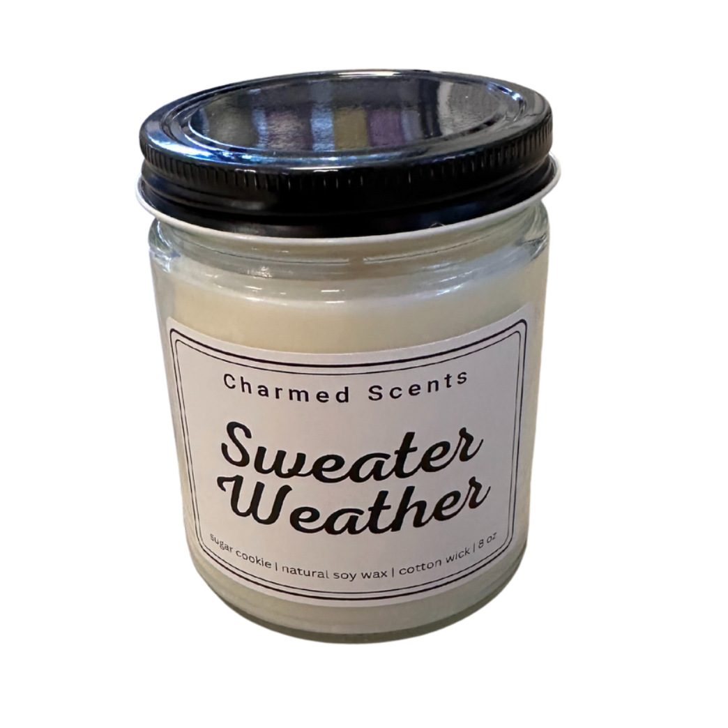 8 oz Sweater Weather soy candle by Charmed Scents – cozy autumn-inspired candle in a glass jar with warm spice scent and clean-burning soy wax, perfect for fall décor or gifting, available at Be Charmed.