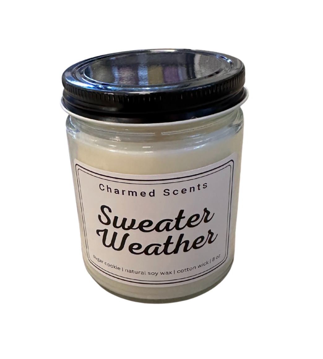8 oz Sweater Weather soy candle by Charmed Scents – cozy autumn-inspired candle in a glass jar with warm spice scent and clean-burning soy wax, perfect for fall décor or gifting, available at Be Charmed.