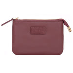 Deep Burgandy Pom Pom London Chelsea Coin Purse – premium handcrafted leather zip purse for coins and cards. Compact and stylish. Available at Be Charmed.