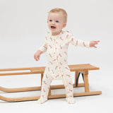 Baby wearing Angel Dear Candy Canes 2-Way Zipper Footie for baby girls, featuring a festive candy cane print and soft materials, available at Be Charmed.