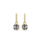 Chloe + Lois Gold earrings with diamond accents on a white background. Available at Be Charmed