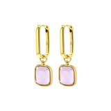 Chloe + Lois Gold hoop earrings with pink gemstones on a white background. Available at Be Charmed