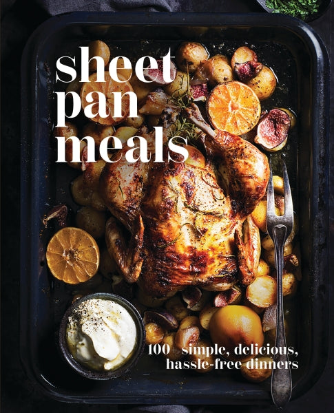 Sheet pan meal with roasted chicken and vegetables on a dark surface, featuring the text 'sheet pan meals' and '100 simple, delicious, hassle-free dinners'. Available at Be Charmed
