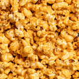 Close of Picture of Poppy Handcrafted Popcorn Pimento Cheese Snack Bag featuring bold Southern-style cheddar and pepper flavor in a cheesy, savory gourmet snack, available at Be Charmed