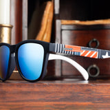 Close up of Goodr Class of 1776 Sunglasses featuring red, white, and blue frames with polarized lenses, designed for patriotic style and active comfort, available at Be Charmed