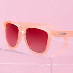 Goodr Don’t Make Me Blush polarized pink sunglasses with no-slip fit — Available at Be Charmed