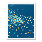 Motivational poster with colorful stars and confetti on a blue card, featuring a quote by Paul Simon. Available at Be Charmed