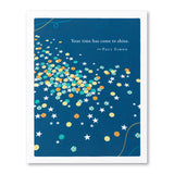 Motivational poster with colorful stars and confetti on a blue card, featuring a quote by Paul Simon. Available at Be Charmed