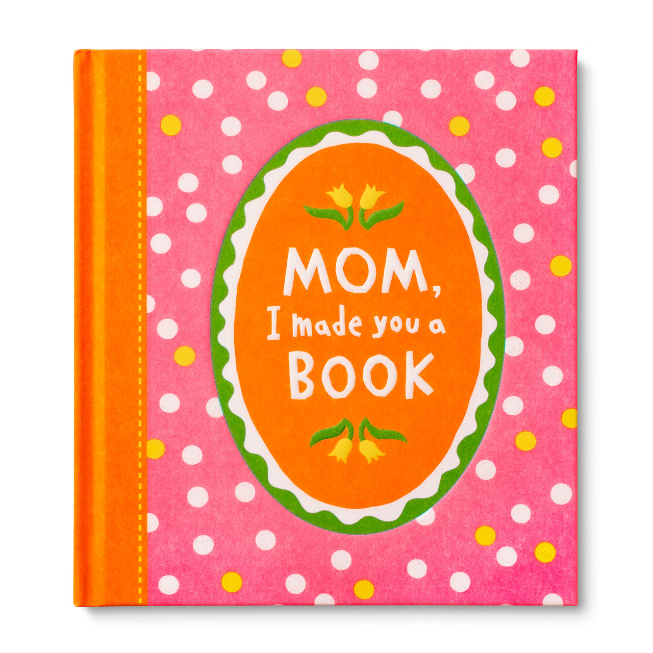Book titled 'Mom, I made you a Book' with pink polka dot cover. Available at Be Charmed