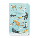 Journal cover with illustrations of dogs on a light blue background. Available at Be Charmed