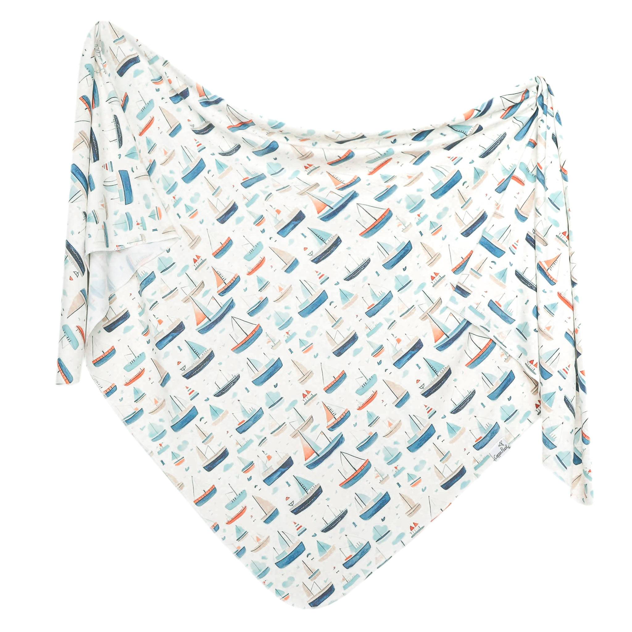Copper Pearl Fischer Knit Swaddle Blanket – Soft, breathable, and perfect for newborns to toddlers. Available at Be Charmed.