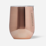 Corkcicle 12oz Stemless insulated tumbler in metallic Copper finish with triple-wall insulation, sliding spill-resistant lid, stainless steel body, ergonomic shape, and flat silicone base. Keeps drinks hot or cold. Available at Be Charmed.