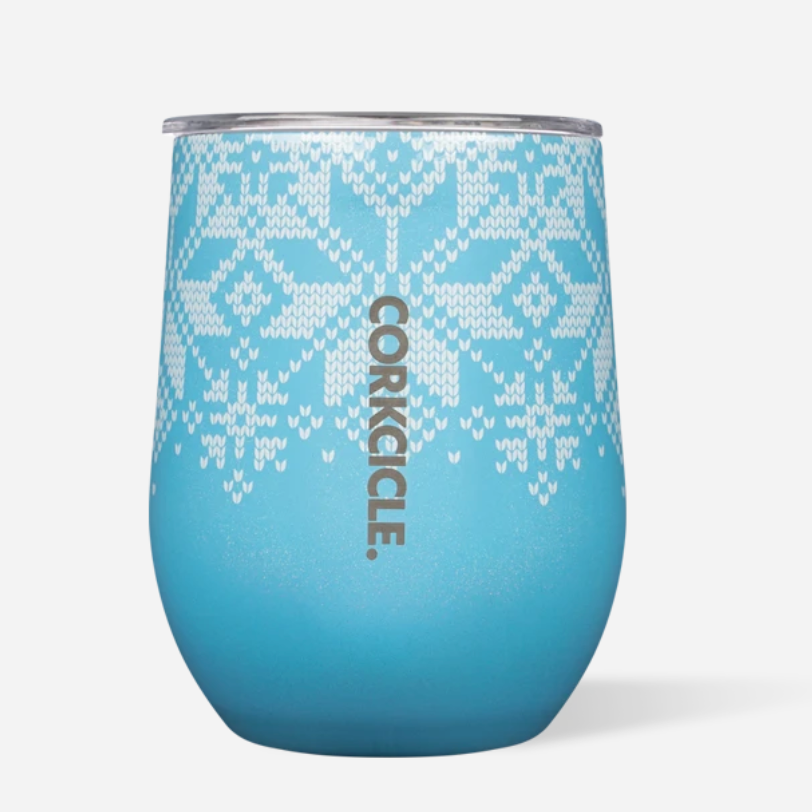 Corkcicle 12oz Stemless in Fairisle Blue – triple-insulated stainless steel tumbler with a festive Fairisle sweater pattern in wintry blue and white. Includes a clear, spill-resistant lid. Keeps beverages cold for 9+ hours or hot for 3+. Perfect for holiday sipping or cozy winter drinks. Available at Be Charmed.