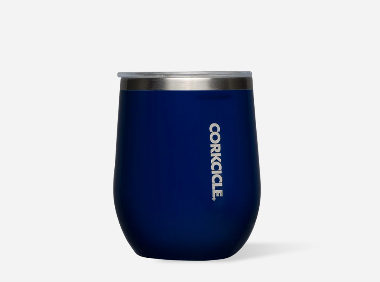 Corkcicle 12oz Stemless Tumbler in Gloss Midnight Navy – triple-insulated stainless steel drinkware with a sleek, deep navy finish and glossy sheen. Designed to keep drinks hot for 3+ hours or cold for 9+, ideal for wine, coffee, or cocktails. Available at Be Charmed.