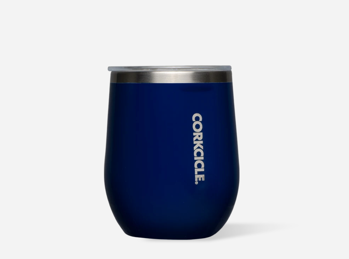 Corkcicle 12oz Stemless Tumbler in Gloss Midnight Navy – triple-insulated stainless steel drinkware with a sleek, deep navy finish and glossy sheen. Designed to keep drinks hot for 3+ hours or cold for 9+, ideal for wine, coffee, or cocktails. Available at Be Charmed.