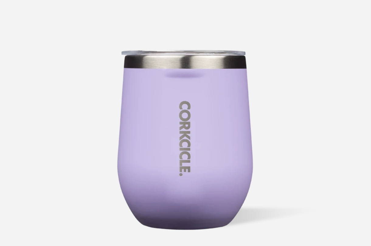 Corkcicle 12oz Stemless wine tumbler in soft Lilac color with triple-wall vacuum insulation for temperature retention, spill-resistant sliding lid, ergonomic shape, soft-touch powder coating finish, and durable stainless steel construction. Available at Be Charmed.