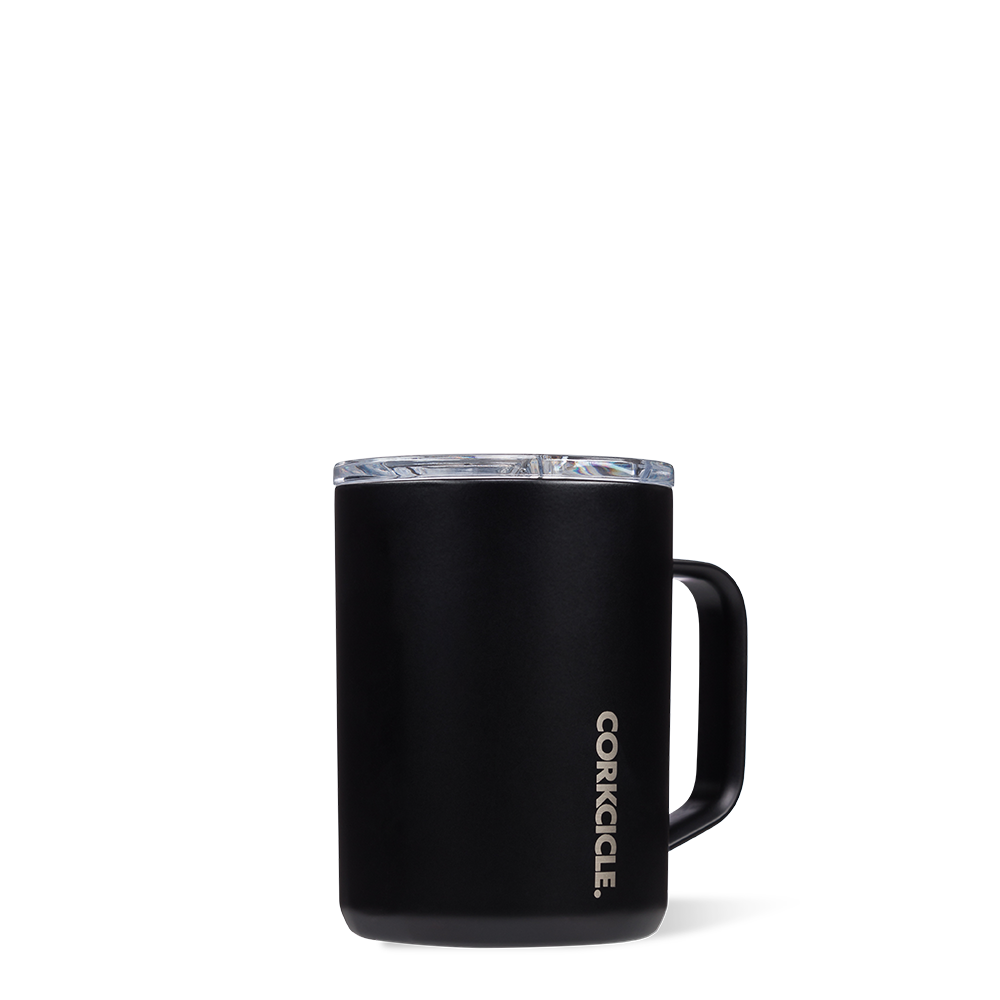 Corkcicle 16oz Mug in Matte Black – sleek, triple-insulated stainless steel coffee mug with a spill-resistant clear lid, ergonomic handle, and modern matte finish. Keeps drinks hot or cold longer, perfect for daily sipping, available at Be Charmed.
