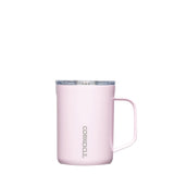 Corkcicle 16oz Mug in Powder Puff – triple-insulated stainless steel mug in soft matte pink with an ergonomic handle and spill-resistant lid. Keeps drinks hot or cold, perfect for cozy sipping, available at Be Charmed.