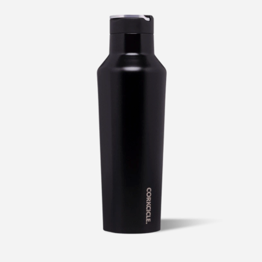 Corkcicle 20oz Sport Canteen in Matte Black with triple-wall vacuum insulation, leak-proof sport sip cap, soft-touch matte finish, flat sides for easy grip, and durable stainless steel body for all-day hydration. Available at Be Charmed.