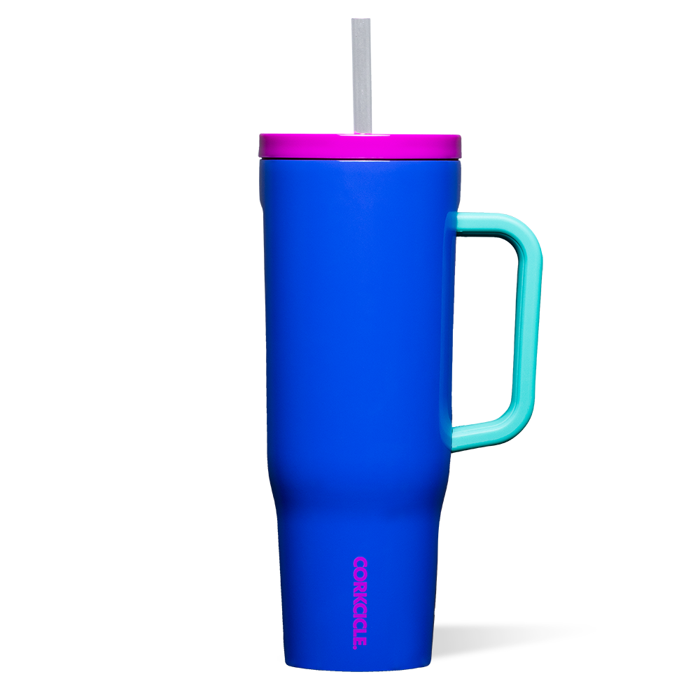 Corkcicle 40oz Cruiser in 80's Windbreaker – bold, triple-insulated stainless steel tumbler with a retro colorblock design, soft-grip handle, and spill-resistant lid with straw. Keeps drinks cold for 20+ hours, available at Be Charmed.