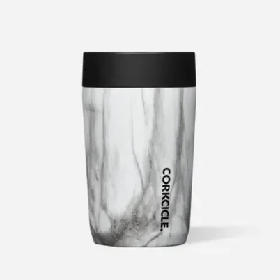 Marble-patterned tumbler with black lid on a white background. Available at Be Charmed