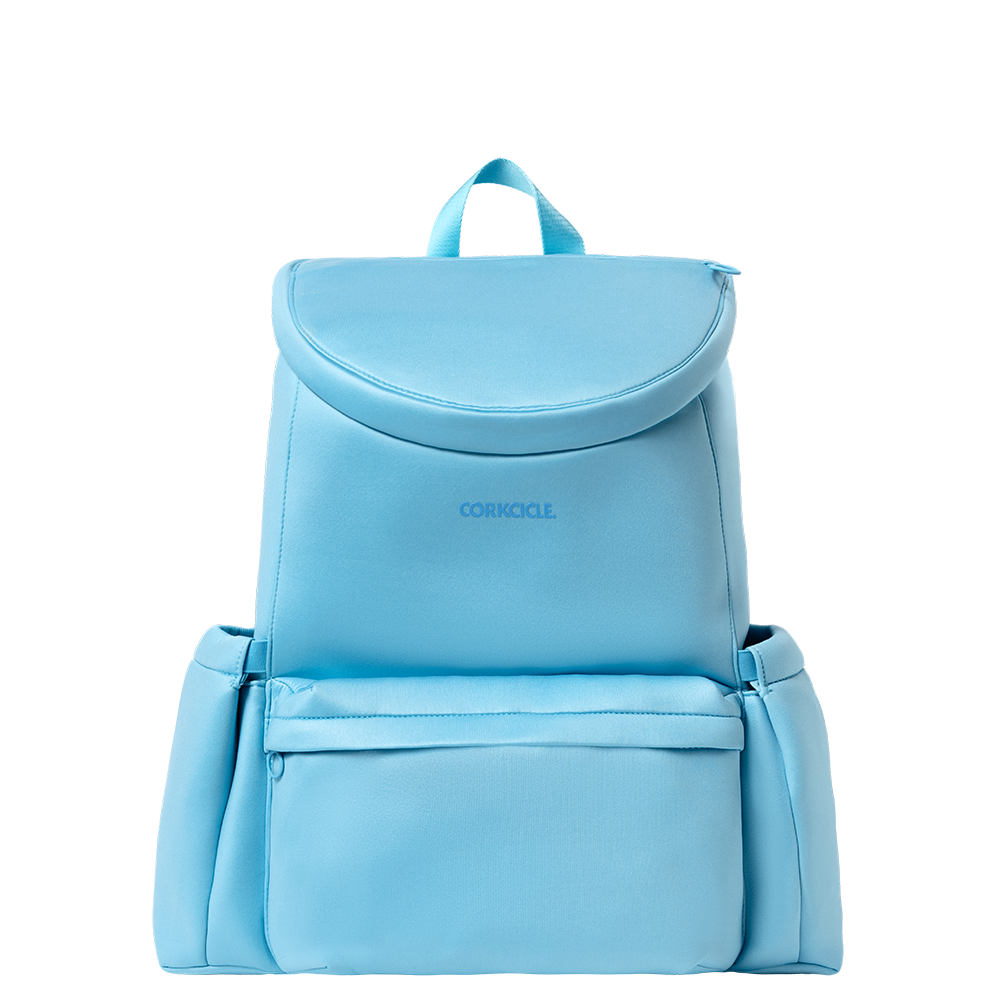 Corkcicle Lotus Pack in Santorini Neoprene – stylish and functional backpack made from soft, durable neoprene in a serene Santorini blue. Features a padded laptop sleeve, adjustable straps, exterior water bottle pocket, and multiple compartments for on-the-go organization. Lightweight, water-resistant, and perfect for daily use or travel. Available at Be Charmed.