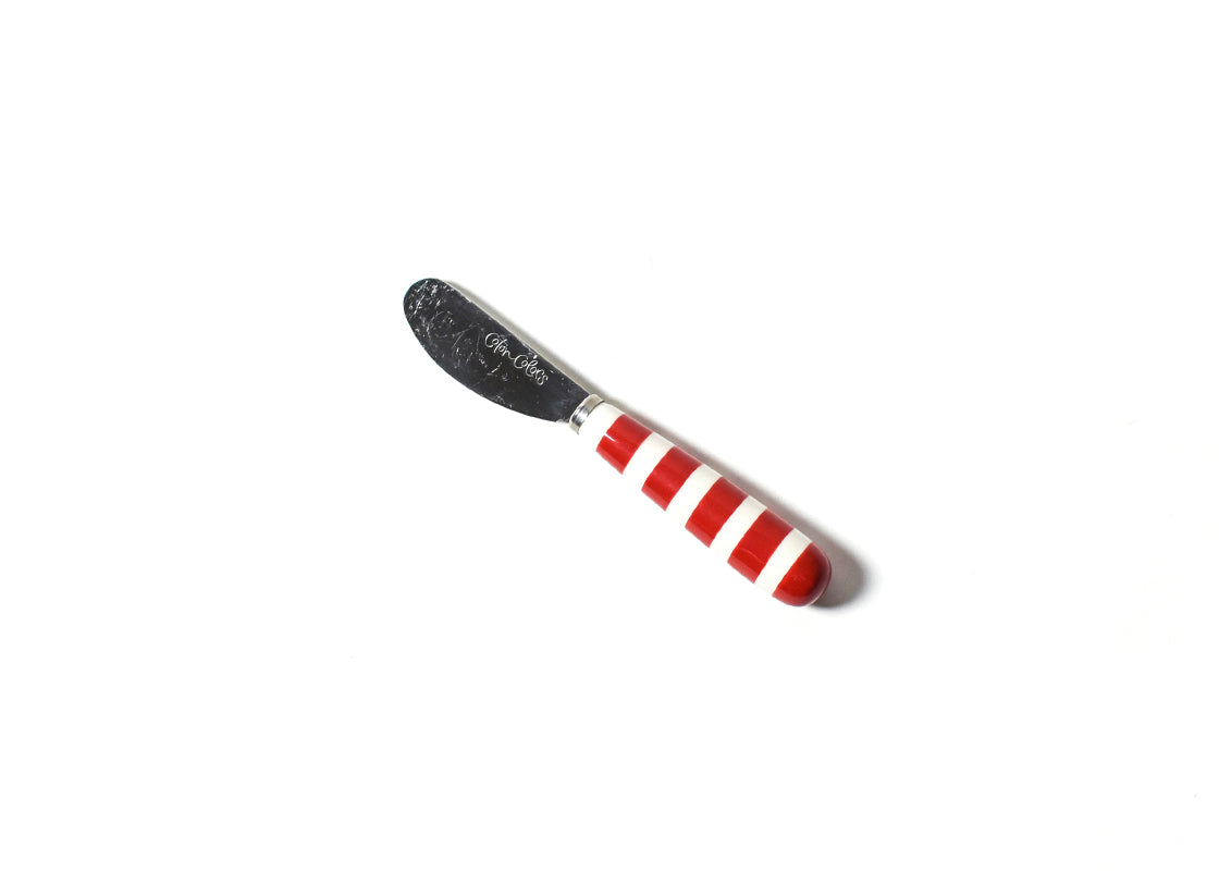 Coton Colors butter knife with a red and white striped handle on a white background. Available at Be Charmed. 