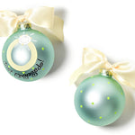 Two round glass ornaments with a hand-illustrated engagement ring and yellow ribbons for decoration. Available at Be Charmed