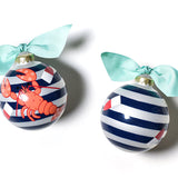 Two Christmas ornaments with striped patterns and lobster designs, tied with light blue ribbons on a white background. Available at Be Charmed
